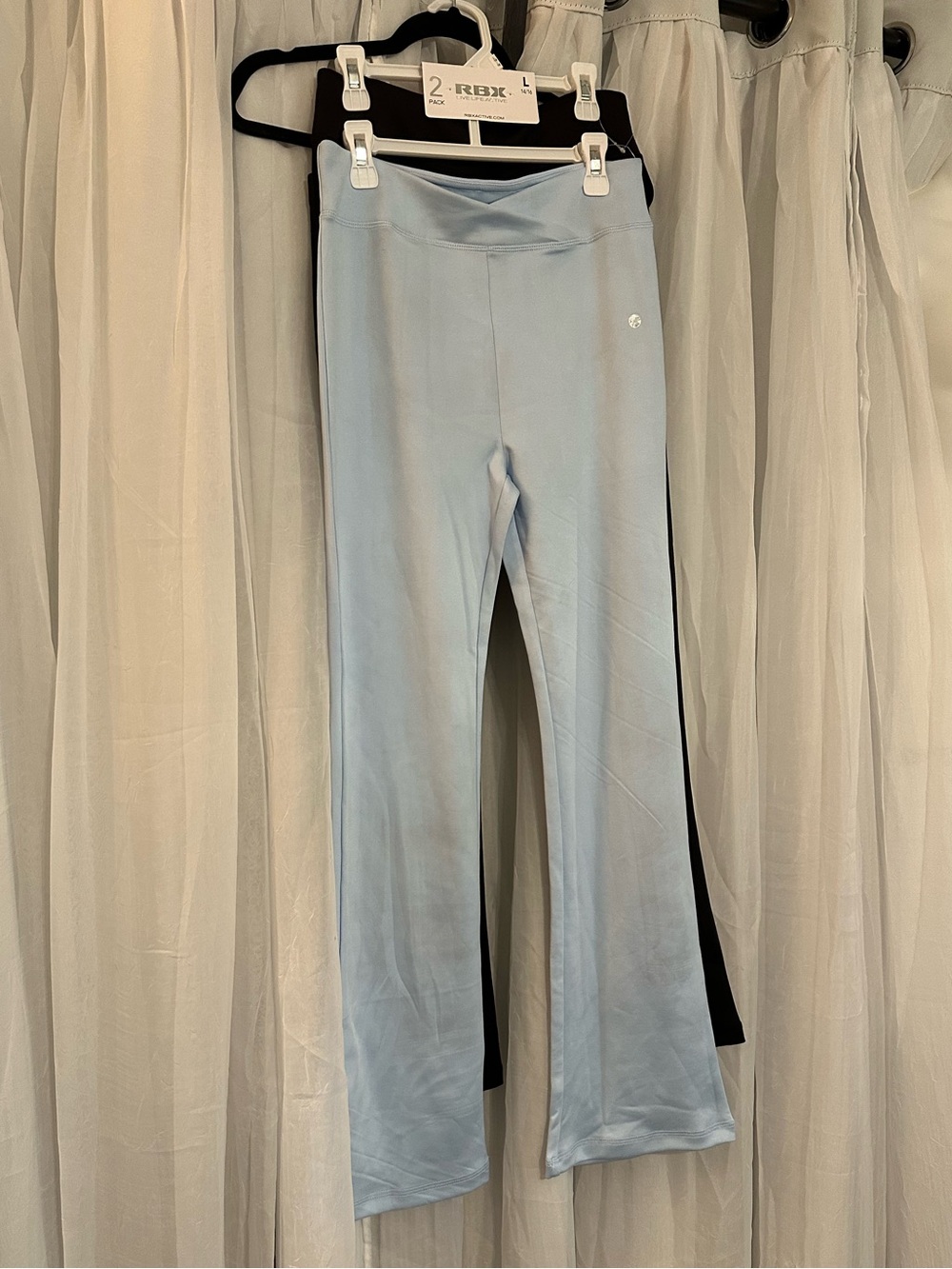 RBX Flare Leg Yoga Pants 2 pair. 1 baby blue and the other black.